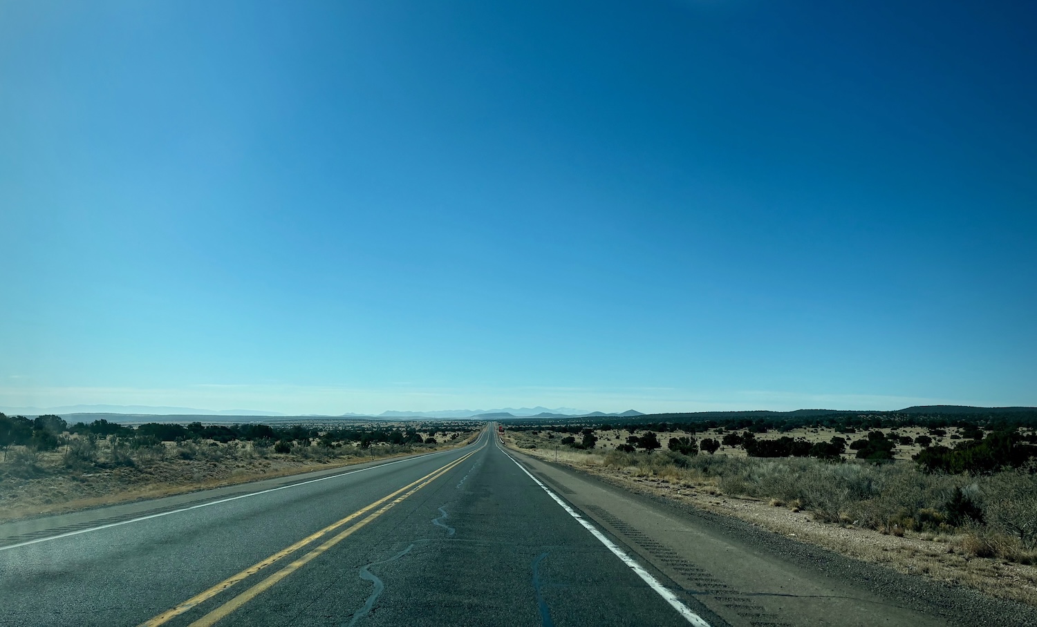 New Mexican highway with blue sky.