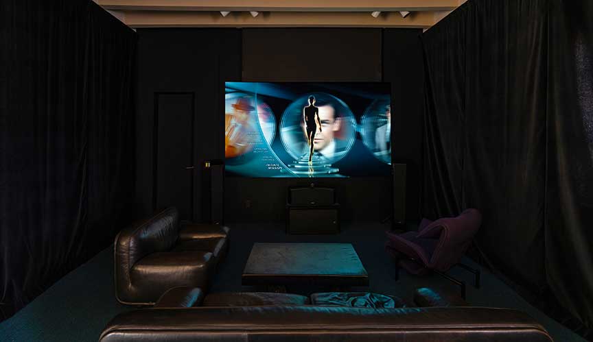 Luxury homes in Santa Fe may include a comfortable viewing room. Photo courtesy Ricky Allen.