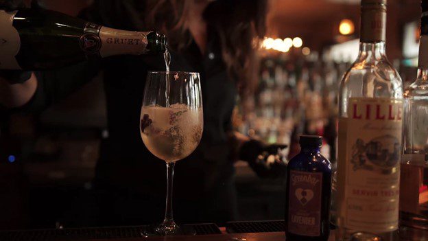 wine being poured into a glass