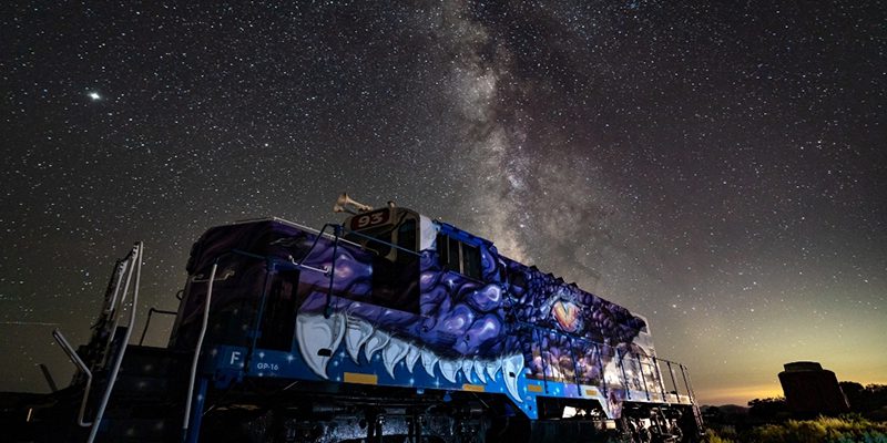 Night sky behind Sky Railway train.