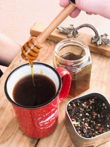 Mug of tea with honey