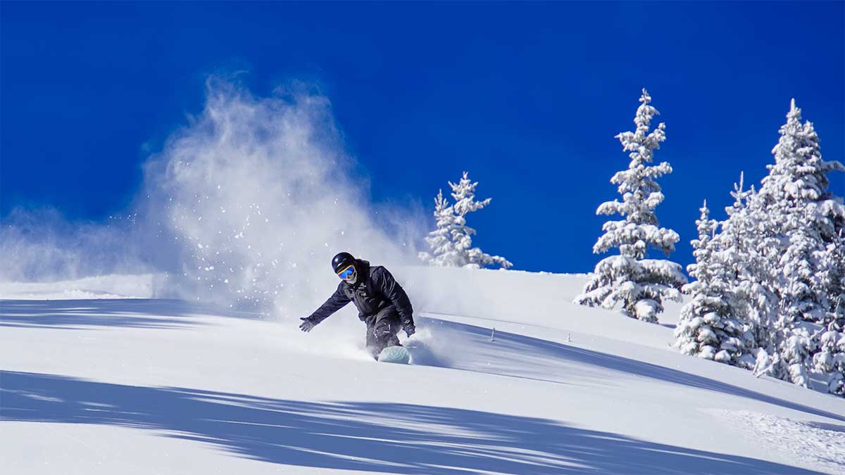A snowboarder enjoys some of the fantastic fluff at Wolf Creek. Photo courtesy Wolf Creek.