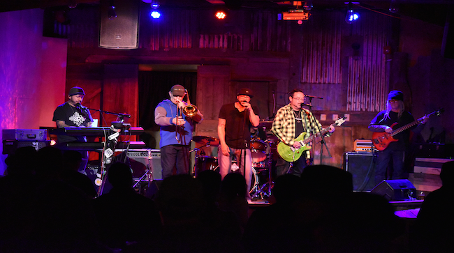 Tumbleroot in Santa Fe New Mexico with pink lighting.